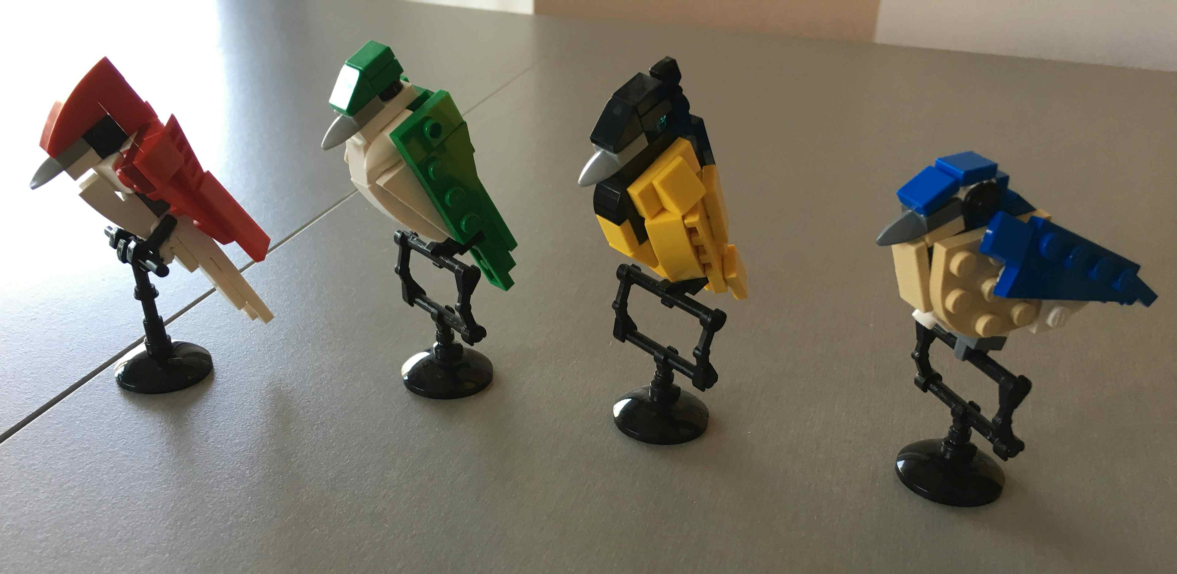 A series of 3" tall LEGO Birds I made with forms inspired by their miniature scale.